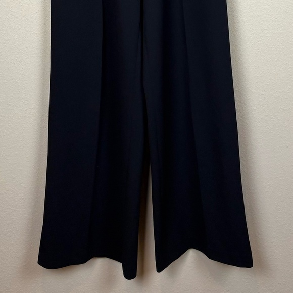 Tommy Hilfiger Black Long Sleeve V-Neck Jumpsuit with Chain Detail; Size 2 - Picture 4 of 13